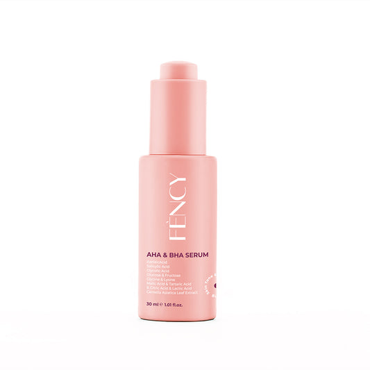 FÈNCY AHA & BHA Serum 30ml in a blush-pink pump bottle on white background – exfoliating acid serum available in UAE
