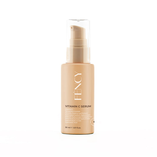 FÈNCY Vitamin C Serum 30ml in a beige pump bottle on white background – brightening serum for UAE skin